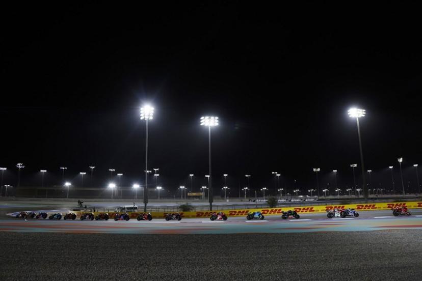 Riders compete during the Qatar MotoGP Grand Prix at the Lusail International Circuit in Lusail, north of Doha, on April 13, 2025.  Karim JAAFAR / AFP