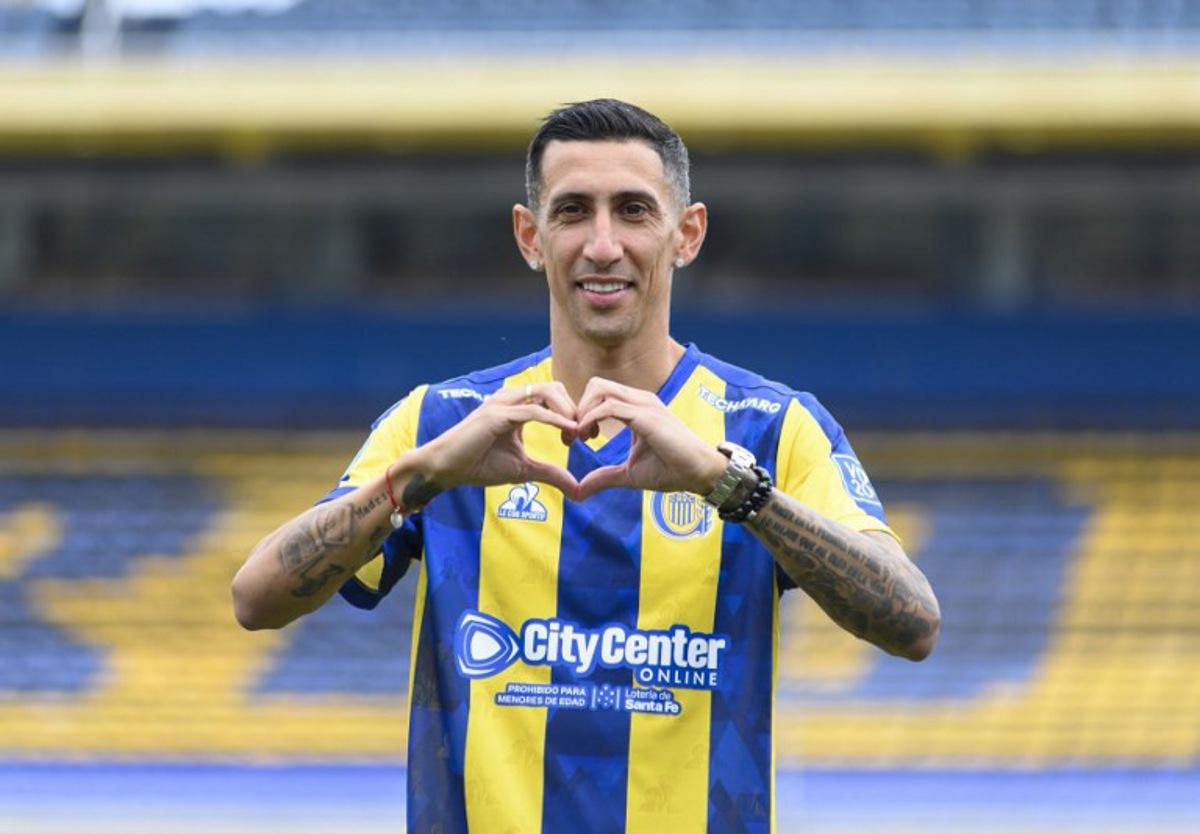 Argentina Rosario Central's forward Angel Di Maria poses with his jersey during his presentation at the Gigantes de Arroyito Stadium in Rosario, Argentina, on July 7, 2025. World Cup champion Angel Di Maria, who has had an outstanding career with European giants, is returning at the age of 37 to Argentine football to play for Rosario Central, the club where he began his career, the Rosario-based team confirmed on May 29, 2025. Marcelo Manera / AFP