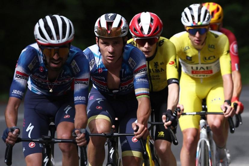 Soudal Quick-Step's Belgian rider Remco Evenepoel (2ndL), Team Visma - Lease a Bike's Danish rider Jonas Vingegaard and UAE Team Emirates XRG's Slovenian rider Tadej Pogačar wearing the overall leader's yellow jersey cycle during the 8th and final stage of the 77th edition of the Criterium du Dauphine cycling race, 133,3 km between Val-d'Arc and Val-Cenis - Plateau du Mont Cenis, on June 15, 2025.  Anne-Christine POUJOULAT / AFP