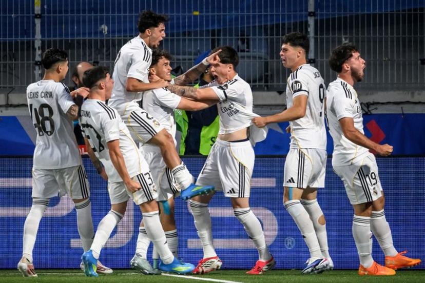 Real Madrid's players celebrate scoring their team first goal during the UEFA Youth League semi-final football match between Real Madrid and Paris Saint-Germain at Stade de la Tuiliere in Lausanne, on April 17, 2026.  Fabrice COFFRINI / AFP
