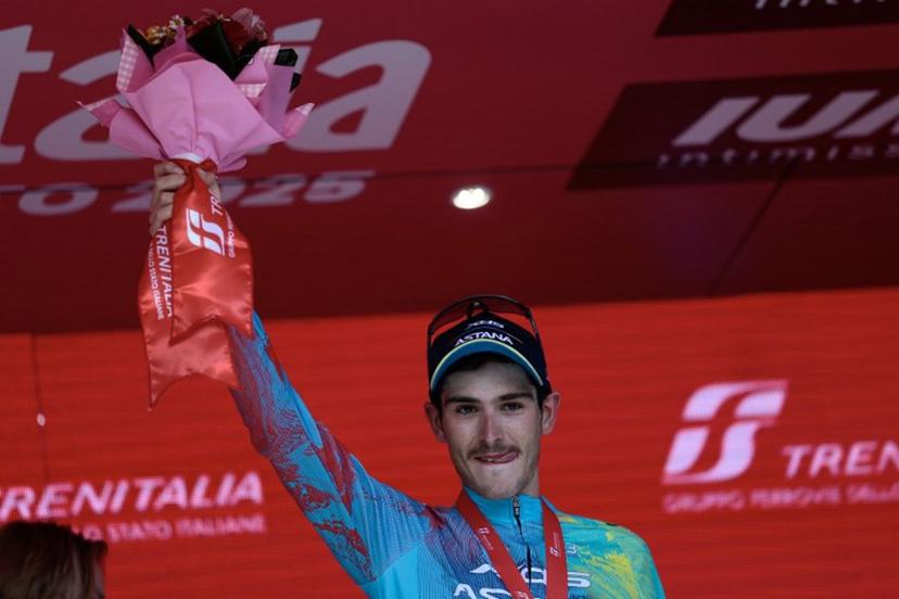 XDS Astana Team's Italian rider Christian Scaroni celebrates on the podium after victory in the 16th stage of the 108th Giro d'Italia cycling race of 203kms from Piazzola sul Brenta to San Valentino on May 27, 2025.  Luca Bettini / AFP
