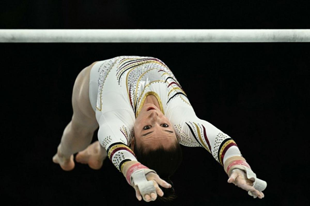 Belgium's Nina Derwael competes in the artistic gymnastics women's uneven bars final during the Paris 2024 Olympic Games at the Bercy Arena in Paris, on August 4, 2024.  Lionel BONAVENTURE / AFP