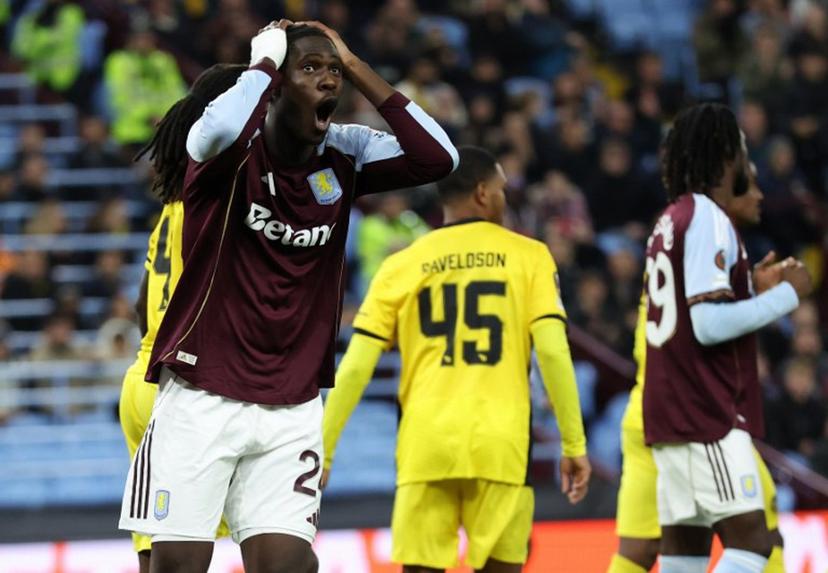 Aston Villa's Belgian midfielder #24 Amadou Onana reacts at a missed opportunity during the UEFA Europa League league-stage football match between Aston Villa and Young Boys at Villa Park in Birmingham on November 27, 2025.  Darren Staples / AFP