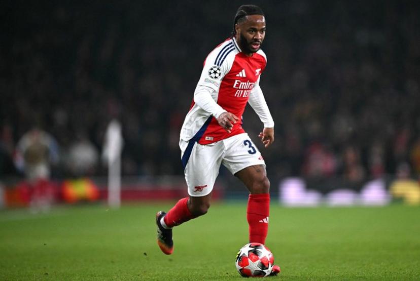 Arsenal's English striker #30 Raheem Sterling runs with the ball during the UEFA Champions League football match between Arsenal and Dinamo Zagreb at the Emirates Stadium in north London on January 22, 2025.  JUSTIN TALLIS / AFP