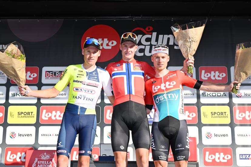 Dutch Mike Teunissen of Intermarche-Wanty, Norwegian Markus Hoelgaard of Uno-X Mobility and Belgian Milan Menten of Lotto Dstny celebrate on the podium after the one day cycling race 'Tour of Leuven - Memorial Jef Scherens' in Leuven, Thursday 15 August 2024. BELGA PHOTO MAARTEN STRAETEMANS