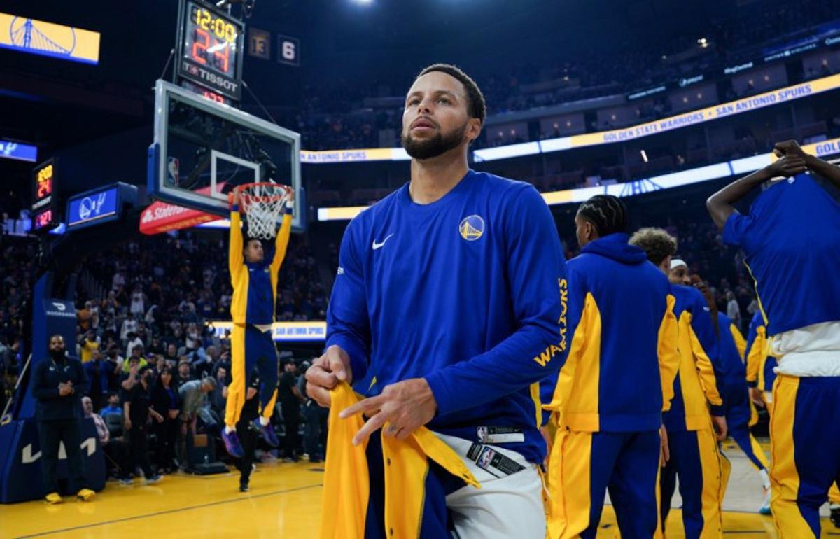Golden State Warriors' US guard #30 Stephen Curry takes the court for the NBA preseason game between the San Antonio Spurs and Golden State Warriors at Chase Center in San Francisco, California on October 20, 2023. Loren Elliott / AFP