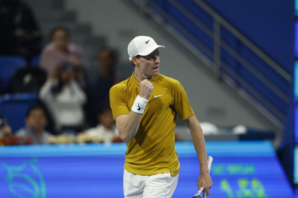 Italy's Jannik Sinner reacts during their men's singles quarterfinal match against Czech Republic's Jakub Mensik at the Qatar Open tennis tournament in Doha on February 19, 2026.  Karim JAAFAR / AFP
