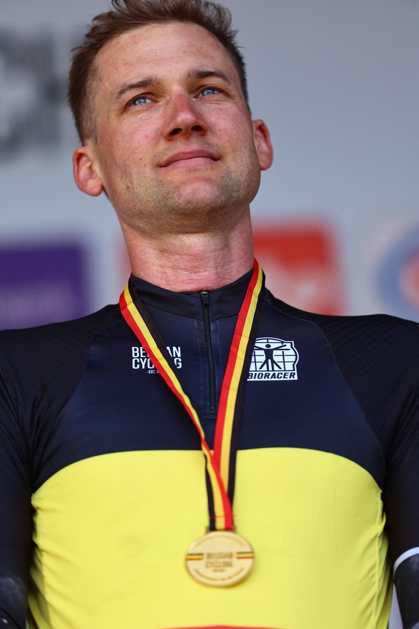 New Belgian champion Tim Wellens of UAE Team Emirates celebrates on the podium the men's elite road race of the Belgian Cycling Championships, 230km from and to the Grand Place square in Binche on Sunday 29 June 2025. BELGA PHOTO DAVID PINTENS