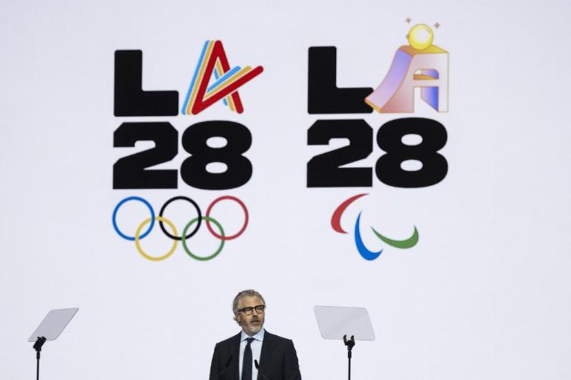 Los Angeles 2028 Olympics chairman, Casey Wasserman speaks during the presentation of an activities report during the 144th session of the International Olympic Committee (IOC), in Costa Navarino, Greece, on the election day of the next IOC President, on March 20, 2025.    Fabrice COFFRINI / AFP