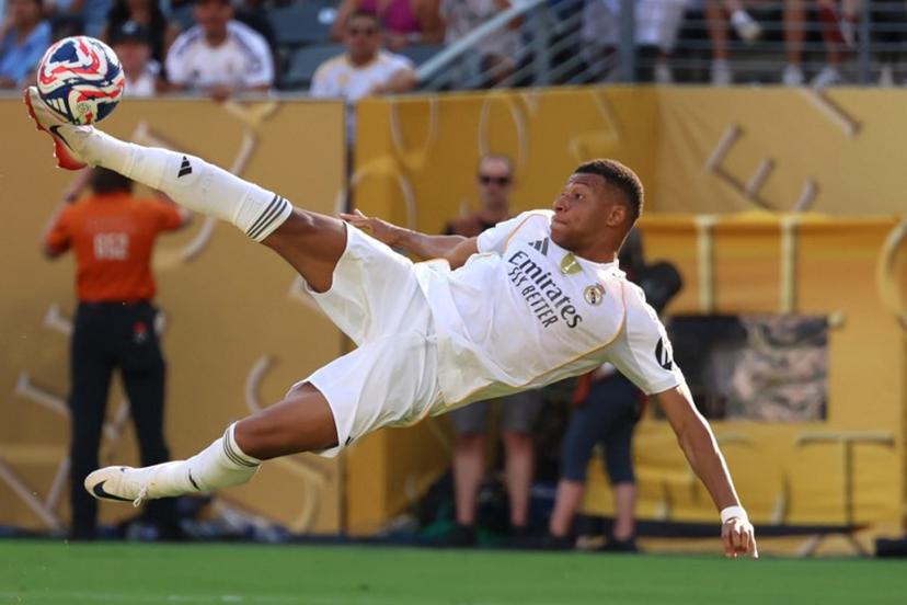 Real Madrid's French forward #09 Kylian Mbappe scores his team's third goal during the FIFA Club World Cup 2025 quarterfinal football match between Spain's Real Madrid and Germany's Borussia Dortmund at the MetLife stadium in East Rutherford, New Jersey on July 5, 2025.  CHARLY TRIBALLEAU / AFP