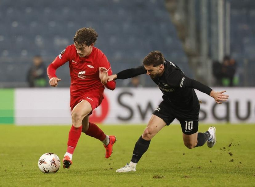 Brann Bergen's Belgian defender #21 Denzel De Roeve (L) and Sturm Graz's Georgian midfielder #10 Otar Kiteishvili vie for the ball during the UEFA Europa League Group first round day 8 football match between Sturm Graz and Brann Bergen in Graz, on January 29, 2026.  ERWIN SCHERIAU / APA / AFP