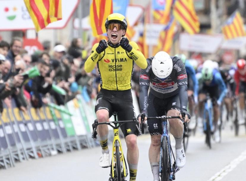 Team Visma's British rider James Matthew Brennan (L) celebrates crossing first the finish line ahead of Team Alpecin's Kaden Groves at the end of the first stage of the 2025 Volta a Catalonya cycling tour of Catalonya, a 178,3 km loop starting and finishing in Sant Feliu de Guixols, on March 24, 2025.  Josep LAGO / AFP