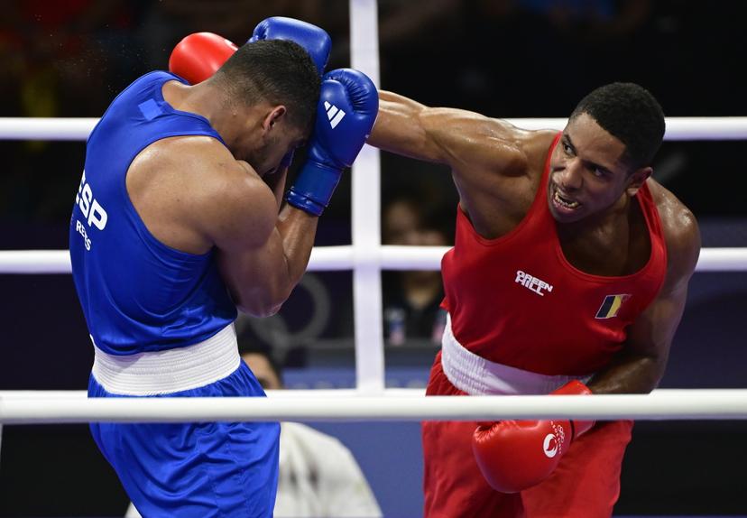 Belgian boxer Victor Schelstraete (red) and Spanish Emmanuel Reyes Pla (blue) pictured in action during a boxing bout between Belgian Schelstraete and Spanish Reyes, the quarter finals of the men's 92kg category at the Paris 2024 Olympic Games, on Thursday 01 August 2024 in Paris, France. The Games of the XXXIII Olympiad are taking place in Paris from 26 July to 11 August. The Belgian delegation counts 165 athletes competing in 21 sports. BELGA PHOTO DIRK WAEM