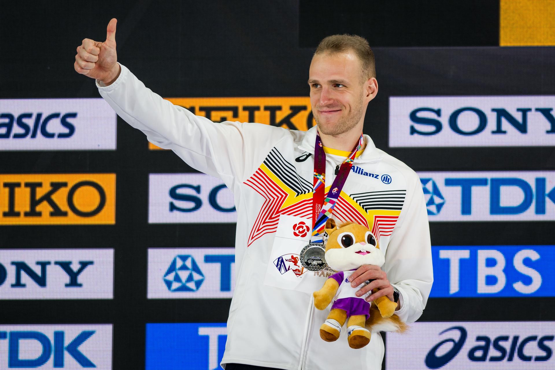 Belgian athlete Eliott Crestan , winner of the silver medal pictured on the podium of the World Athletics Indoor Championships, in Nanjing, China, Sunday 23 March 2025. The championships take place from 21 to 23 March. BELGA PHOTO JASPER JACOBS