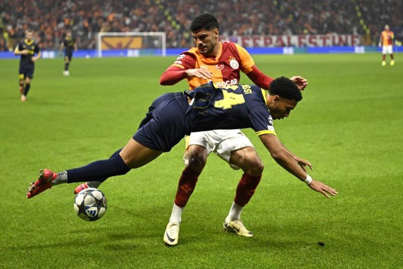 Galatasaray's Turkish defender #17 Evren Eren Elmali fouls Bodo/Glimt's Norwegian forward #24 Daniel Bassi during the UEFA Champions League, league phase - day 3, football match between Galatasaray SK and Bodo/Glimt at the Rams Park in Istanbul on October 22, 2025.  YASIN AKGUL / AFP