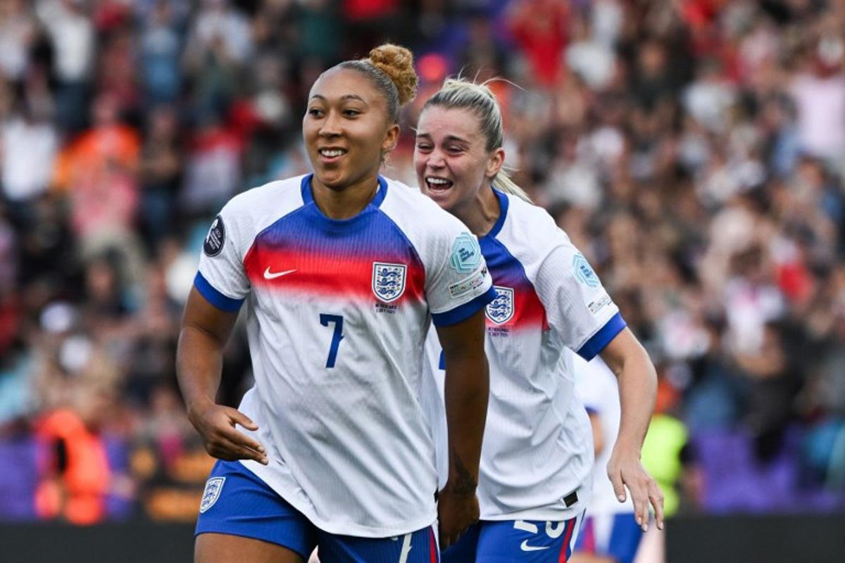 England's forward #07 Lauren James celebrates after scoring the first goal of the match with teamate England's forward #23 Alessia Russo during the UEFA Women's Euro 2025 Group D football match between England and The Netherlands at the Letzigrund Stadium in Zurich, on July 9 2025.  Miguel MEDINA / AFP
