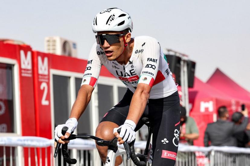 UAE Team Emirates's Mexican rider Isaac Del Toro Romero looks on after winning the first stage of the UAE Tour cycling event from Madinat Zayed Majlis to Liwa Palace in Abu Dhabi on February 16, 2026.  Fadel SENNA / AFP