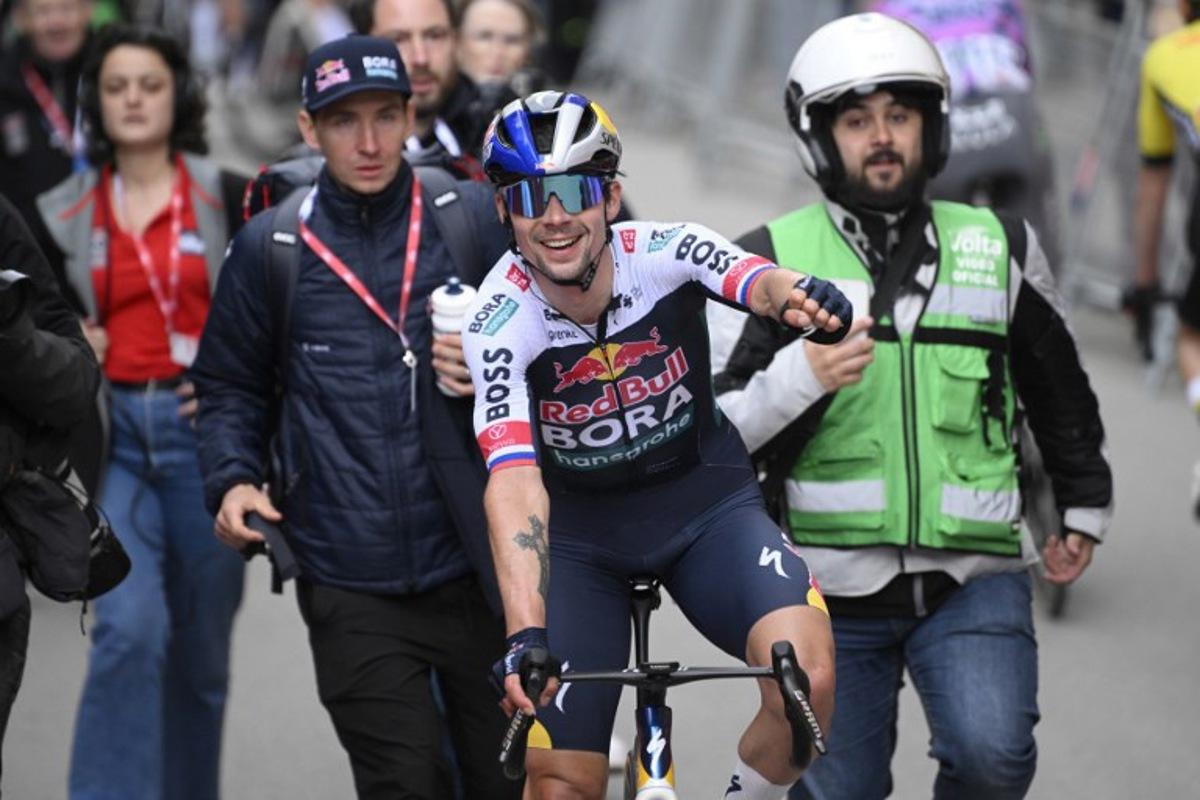 Team Bora's Primoz Roglic celebrates winning the 4th stage of the 2025 Volta a Catalunya cycling tour of Catalonia, a 188,7 km race between Sant Vicenc de Castellet and Montserrat, on March 27, 2025.  Josep LAGO / AFP