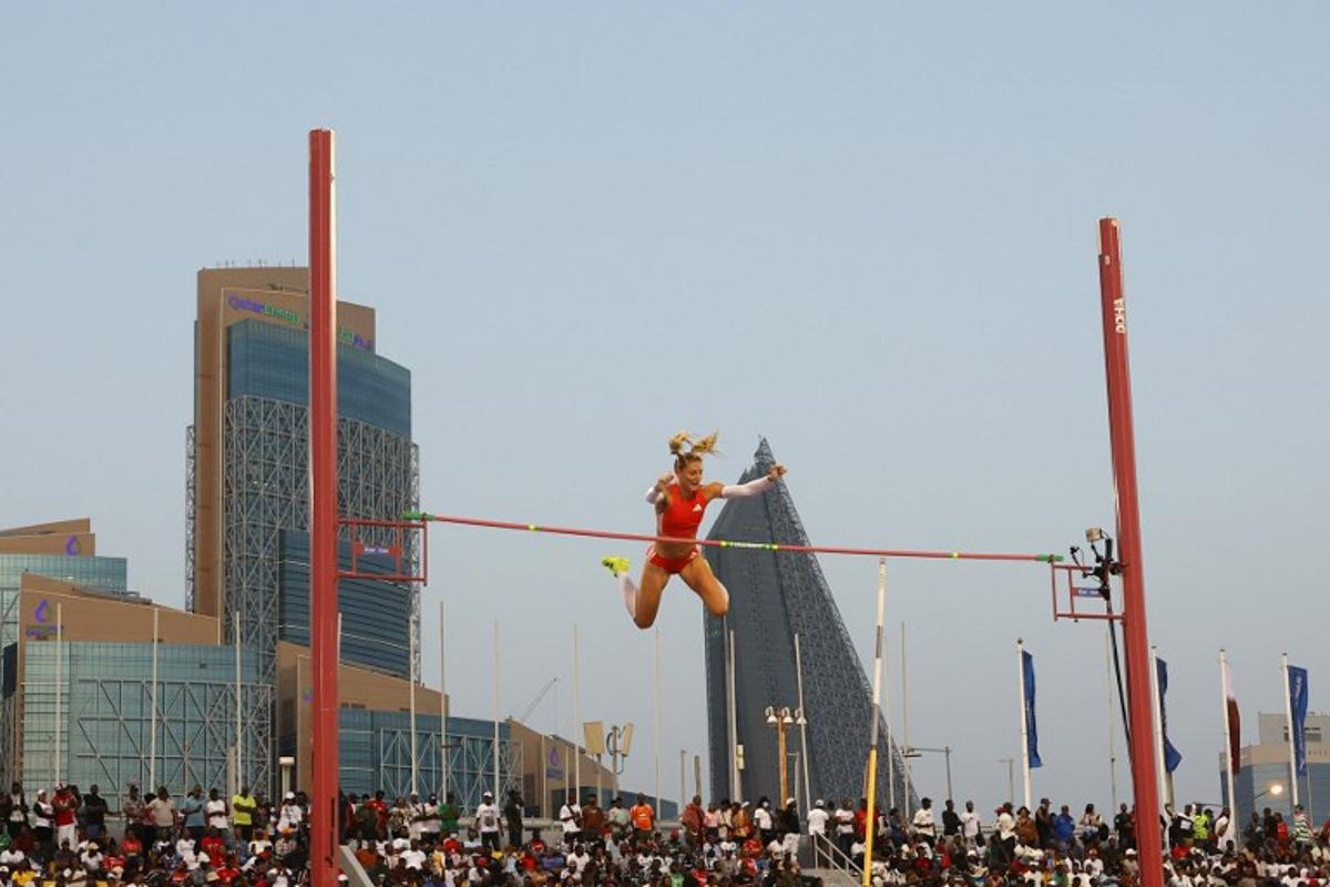 Britain's Molly Caudery competes in the women's Pole Vault final during the IAAF Diamond League competition at the Suheim Bin Hamad Stadium in Doha on May 16, 2025.  Karim JAAFAR / AFP