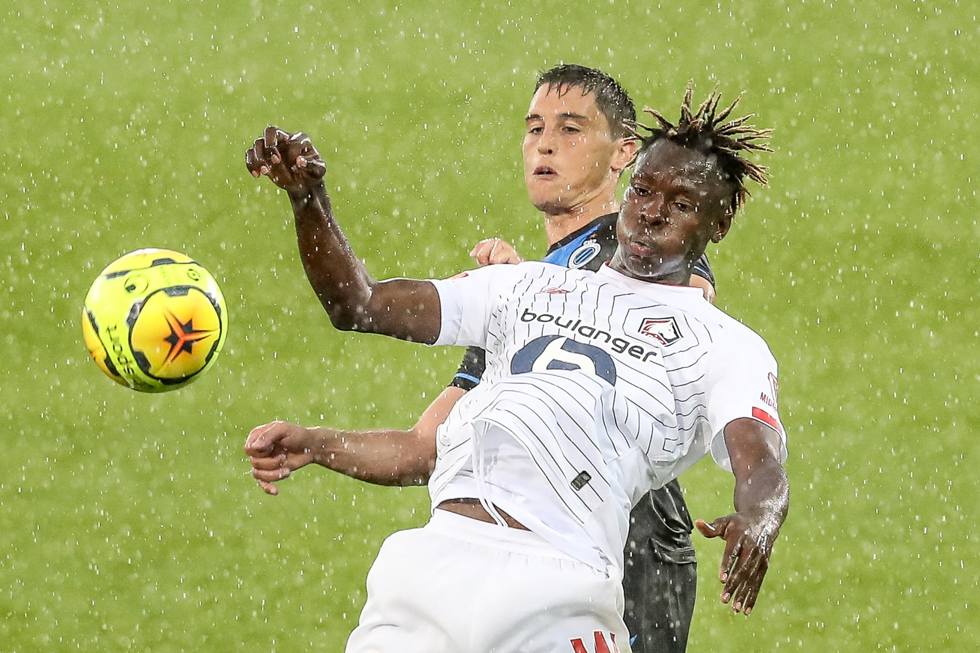 Club's Federico Ricca and Lille's Usman Simbakoli fight for the ball during a friendly soccer game between Club Brugge KV and French team Lille OSC, during the 'Brugse Metten', Saturday 25 July 2020 in Brugge, in preparation of the upcoming 2020-2021 season. BELGA PHOTO BRUNO FAHY