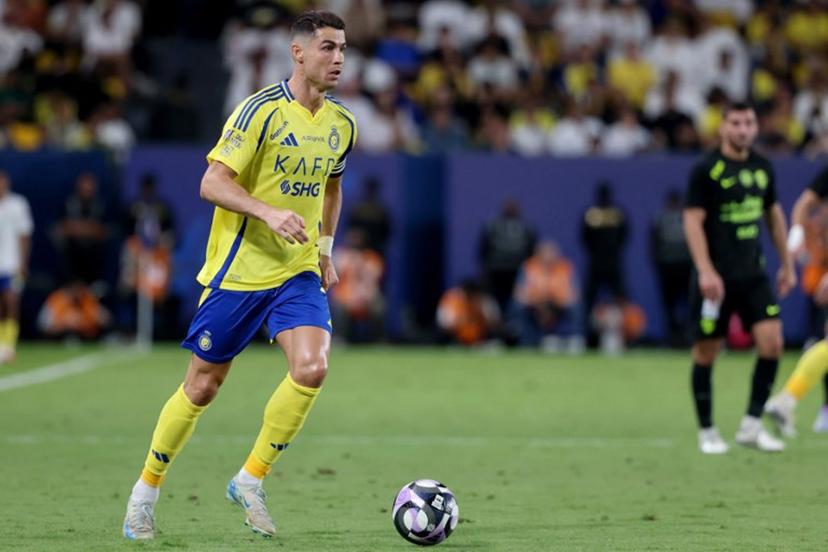 Nassr's Portuguese forward #7 Cristiano Ronaldo looks to pass during the Saudi Pro League football match between Al-Nassr and Al-Ittihad at Al-Awwal Park in Riyadh on May 7, 2025.  Fayez NURELDINE / AFP