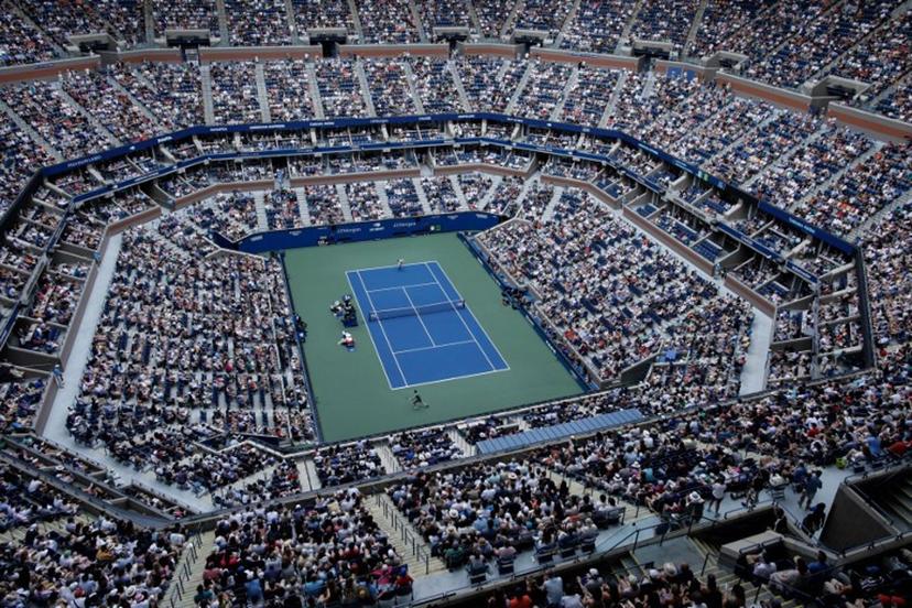 An overall view inside Arthur Ashe Stadium as Italy's Jannik Sinner and Australia's Christopher O'Connell play during their men's singles third round match on day six of the US Open tennis tournament at the USTA Billie Jean King National Tennis Center in New York City, on August 31, 2024.  KENA BETANCUR / AFP