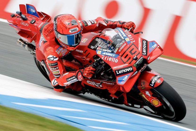Ducati Lenovoi Team's Spanish MotoGP rider Marc Marquez takes a corner during a free practice ahead 2024 Netherlands MotoGP Grand Prix at the TT Circuit Assen, in Assen on June 27, 2025.  Vincent Jannink / ANP / AFP