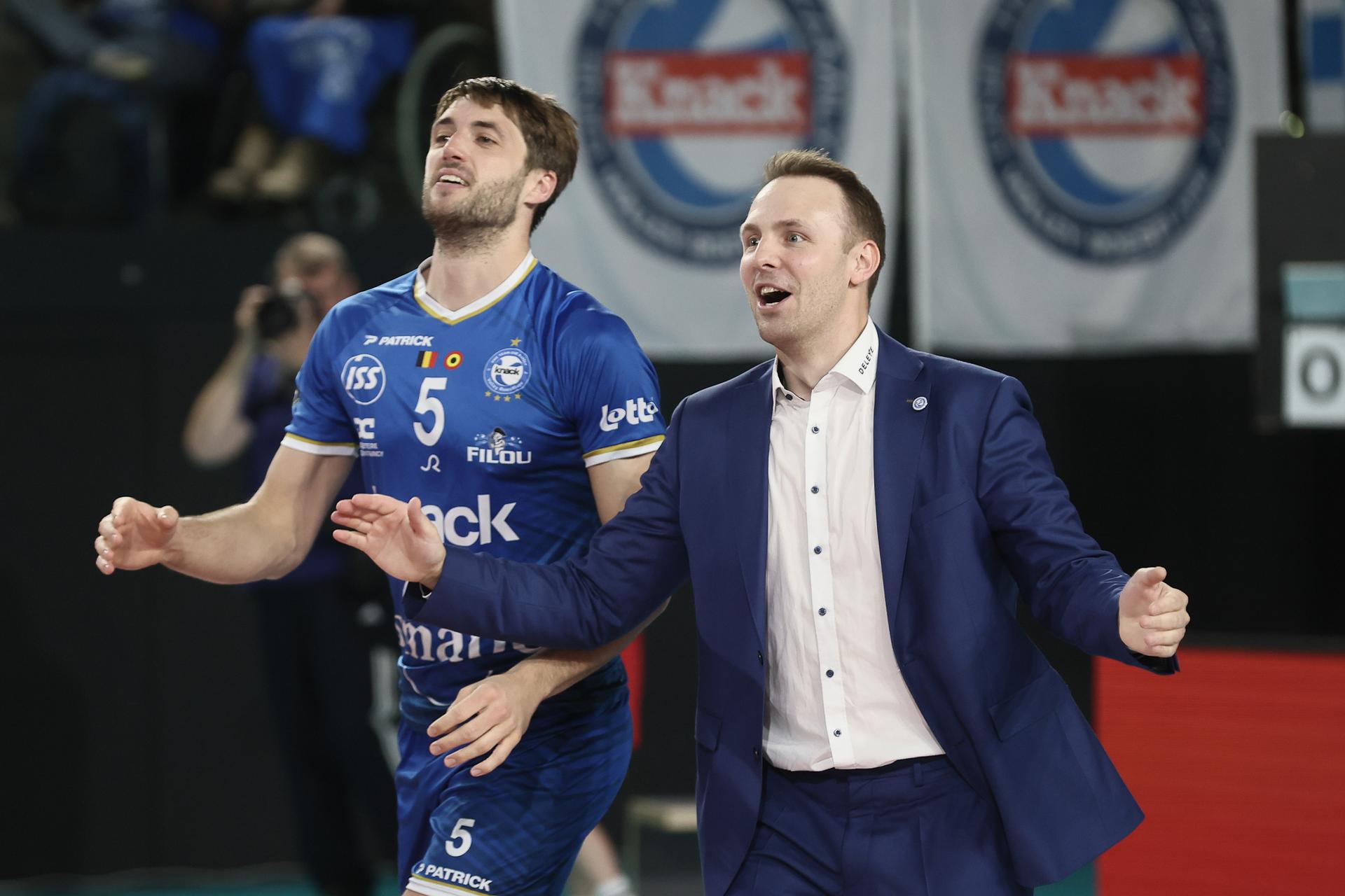 Roeselare's Pieter Coolman and Roeselare's head coach Steven Vanmedegael celebrate after winning a volleyball match between Greenyard Maaseik and Knack Roeselare, Sunday 28 April 2024 in Maaseik, the last match of the best-of-five finals in the Play Offs of the Belgian volleyball competition. BELGA PHOTO BRUNO FAHY