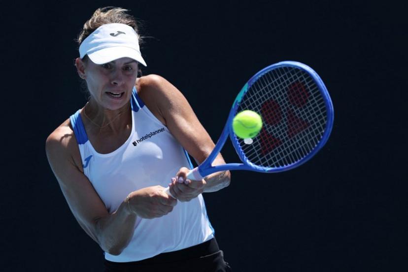 Poland's Magda Linette hits a return against Japan's Moyuka Uchijima during their women's singles match on day two of the Australian Open tennis tournament in Melbourne on January 13, 2025.  Adrian Dennis / AFP