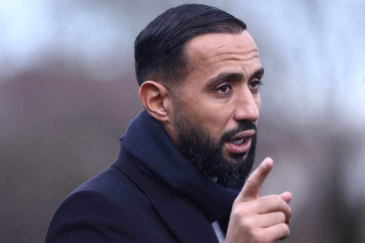Marseille's French-Moroccan football manager Medhi Benatia is pictured prior to the French Cup round of 64 football match between Bourg-en-Bresse (FBBP) and Olympique de Marseille (OM) at the Marcel-Verchere Stadium in Bourg-en-Bresse, eastern France, on December 21, 2025.  Alex MARTIN / AFP