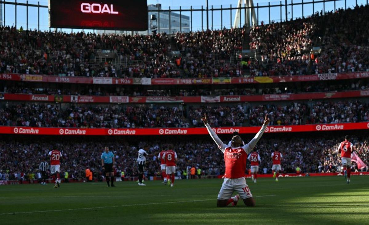 Arsenal's English midfielder #10 Eberechi Eze celebrates scoring the opening goal during the English Premier League football match between Arsenal and Newcastle United at the Emirates Stadium in London on April 25, 2026.   Glyn KIRK / AFP