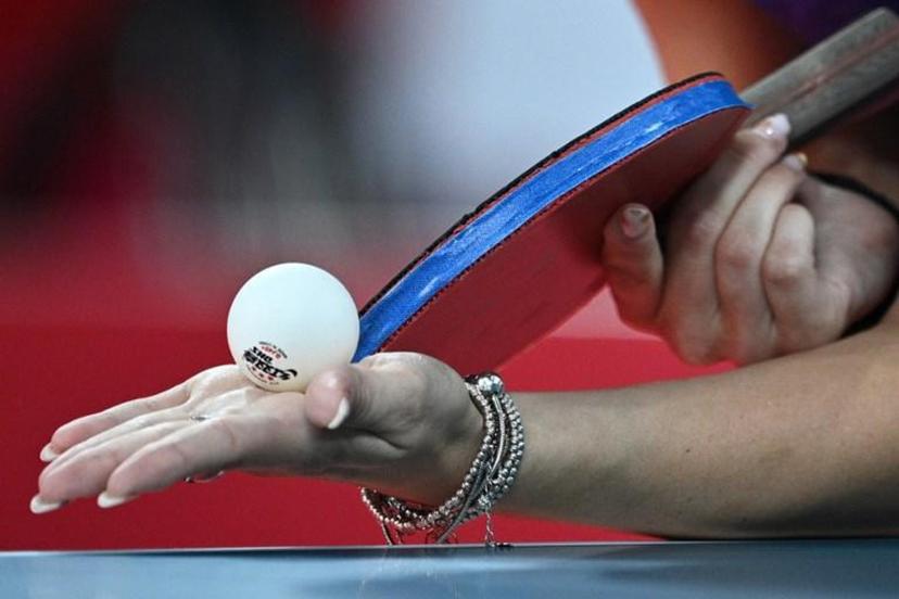 Romania's Bernadette Szocs serves to USA's Juan Liu during her women's singles round 3 table tennis match at the Tokyo Metropolitan Gymnasium during the Tokyo 2020 Olympic Games in Tokyo on July 27, 2021.  Anne-Christine POUJOULAT / AFP