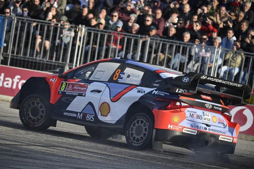 Ott Tanak of Estonia and his co-driver Martin Jarveoja of Estonia compete in their Hyundai i20 N Rally 1 during the SS1 stage of the World Rally Championship (WRC) Rally of Portugal in Figueira da Foz, on May 15, 2025.   MIGUEL RIOPA / AFP