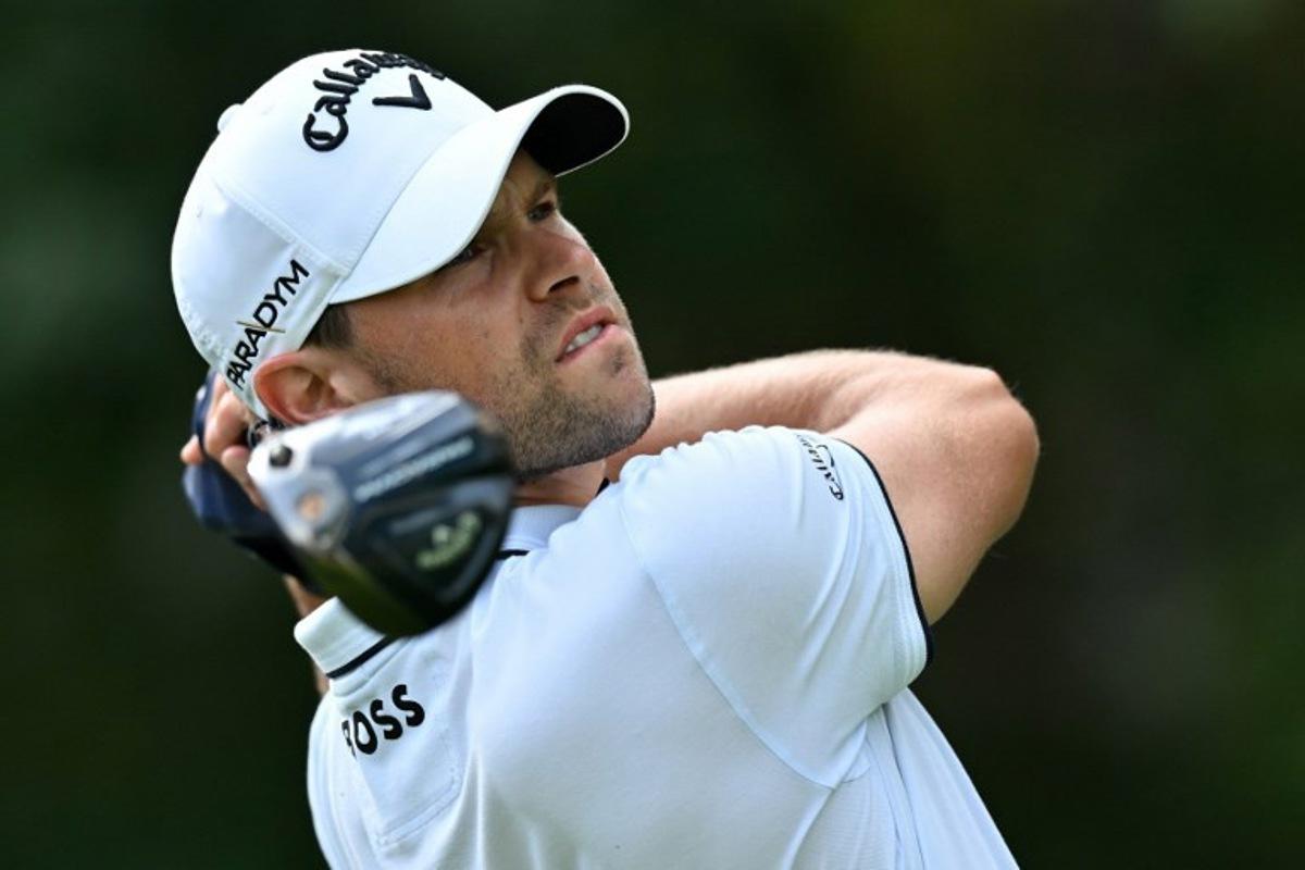 Belgium's Thomas Detry watches his drive from the 13th tee on day three of the BMW PGA Championship at Wentworth Golf Club, south-west of London, on September 16, 2023.  Glyn KIRK / AFP