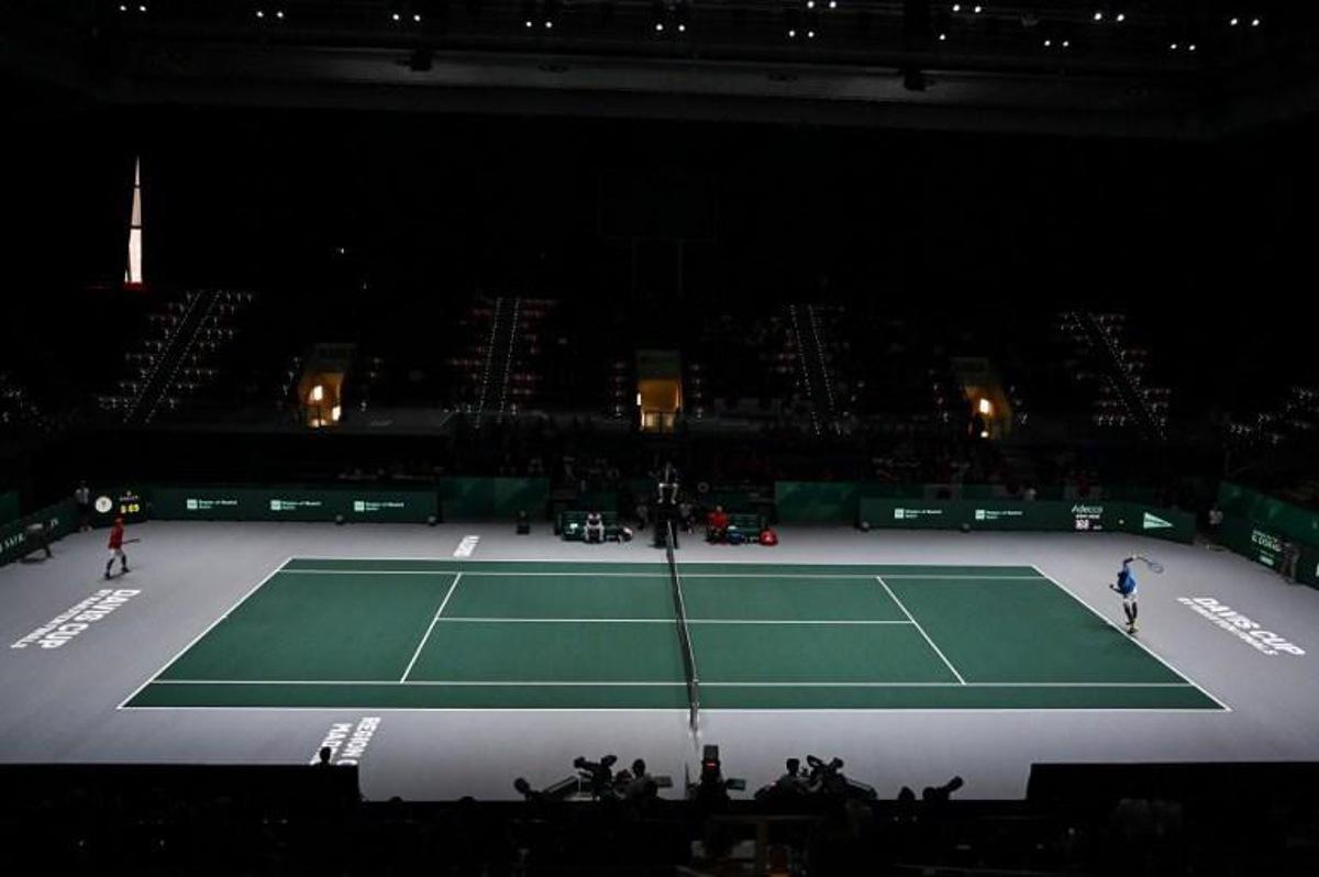 France's Gael Monfils (R) serves the ball to Japan's Yoshihito Nishioka during the singles tennis match between France and Japan at the Davis Cup Madrid Finals 2019 in Madrid on November 19, 2019.   GABRIEL BOUYS / AFP