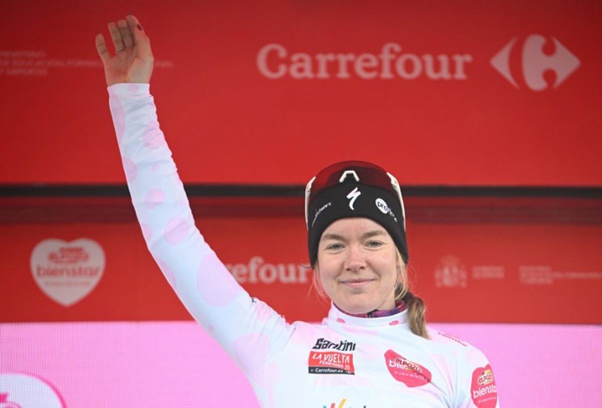 Third placed Team SD Worx Dutch rider Anna van der Breggen celebrates on the podium after the 7th stage of the 2025 La Vuelta Femenina cycling tour of Spain, a 152.6 km race from La Robla to Cotobello, on May 10, 2025.  MIGUEL RIOPA / AFP