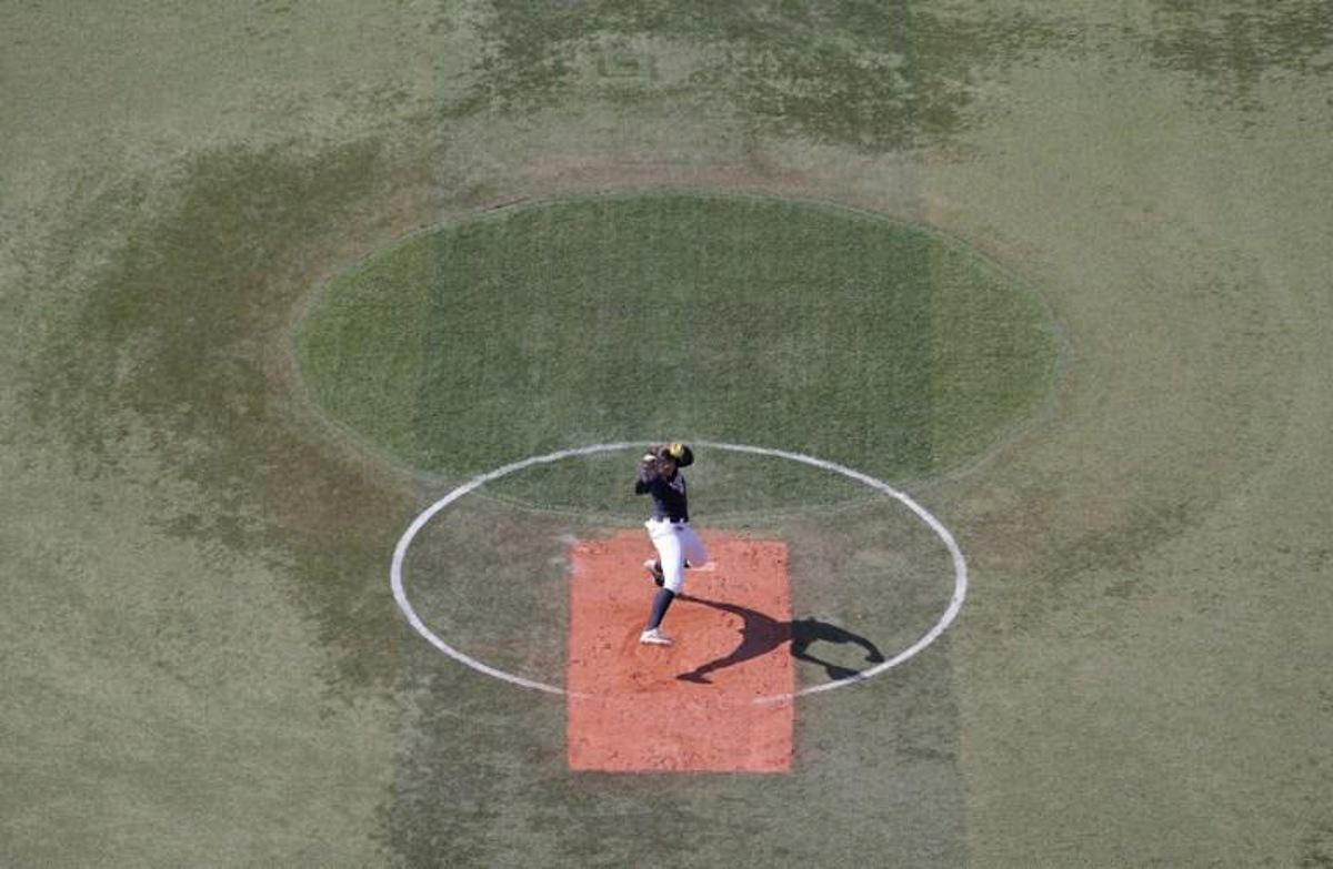 USA's starter Catherine Osterman hurls the ball during first inning of the Tokyo 2020 Olympic Games softball opening round game between USA and Mexico at Yokohama Baseball Stadium in Yokohama, Japan, on July 24, 2021.  KAZUHIRO FUJIHARA / AFP