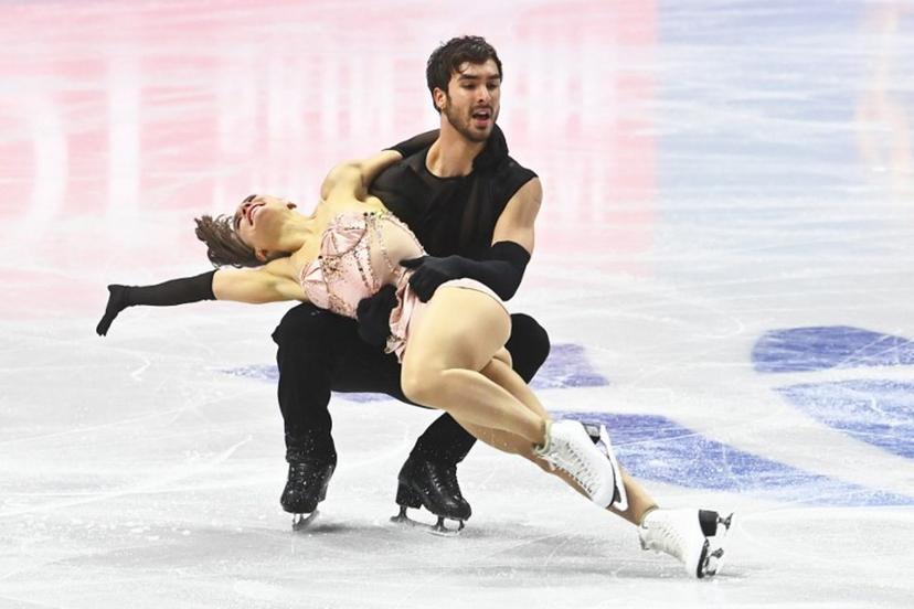 France's Laurence Fournier Beaudry and Guillaume Cizeron perform during the Ice Dance rhythm dance skating program of the 2026 ISU Figure Skating World Championships in Prague on March 27, 2026.  Michal Cizek / AFP