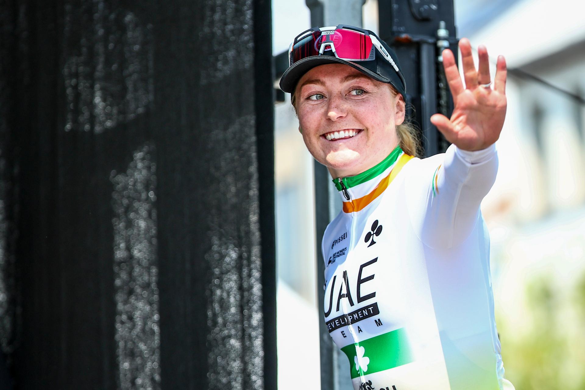 Irish Lara Gillespie of UAE Development team celebrates on the podium after winning the 'Antwerp Port Epic' 'Schaal Sels' women's elite one day cycling race, 140,1 km in and around Antwerp, fifth race (5/10) in the Lotto Cycling Cup, Sunday 19 May 2024. BELGA PHOTO DAVID PINTENS