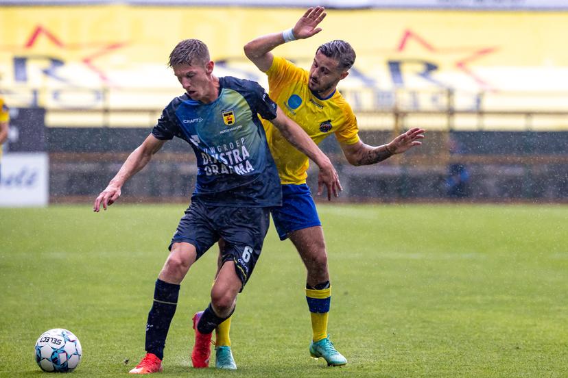 Cambuur's Mees Hoedemakers and Waasland-Beveren's Jordan Faucher Chebel fight for the ball during a friendly soccer game between Waasland-Beveren and Dutch club FC Cambuur, Saturday 07 August 2021 in Beveren. BELGA PHOTO KURT DESPLENTER