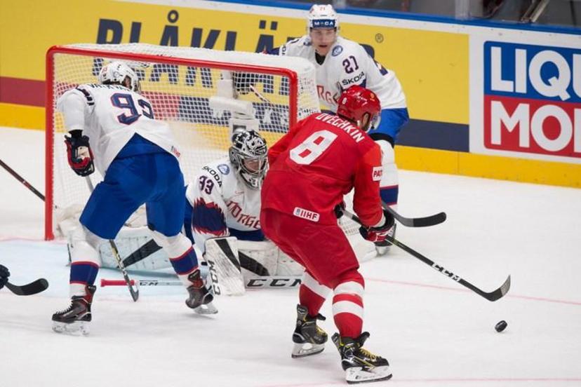 Russia?s forward Alexander Ovechkin (R) vies with Norway's goalkeeper Henrik Haukeland and Norway's forward Thomas Valkvae Olsen (L)  during the IIHF Men's Ice Hockey World Championships Group B match between Russia and Norway on May 10, 2019 in Bratislava.  VLADIMIR SIMICEK / AFP