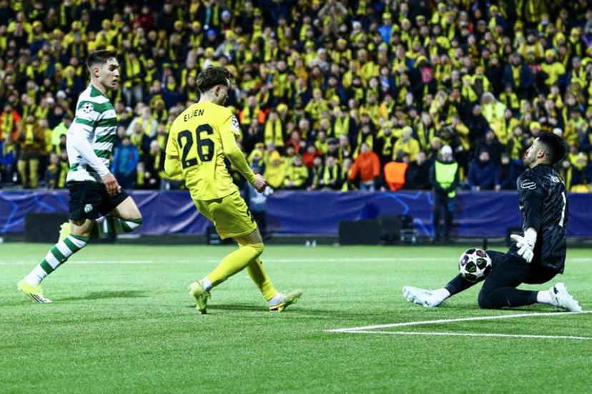 Bodo/Glimt's Norwegian midfielder #26 Hakon Evjen (C) attempts top score past Sporting Lisbon's Portuguese goalkeeper #01 Rui Silva (R) during the UEFA Champions League, Last 16, first-leg football match Bodo/Glimt vs Sporting CP at the Aspmyra stadium, in Bodo, Norway on March 11, 2026.    Mats Torbergsen / NTB / AFP