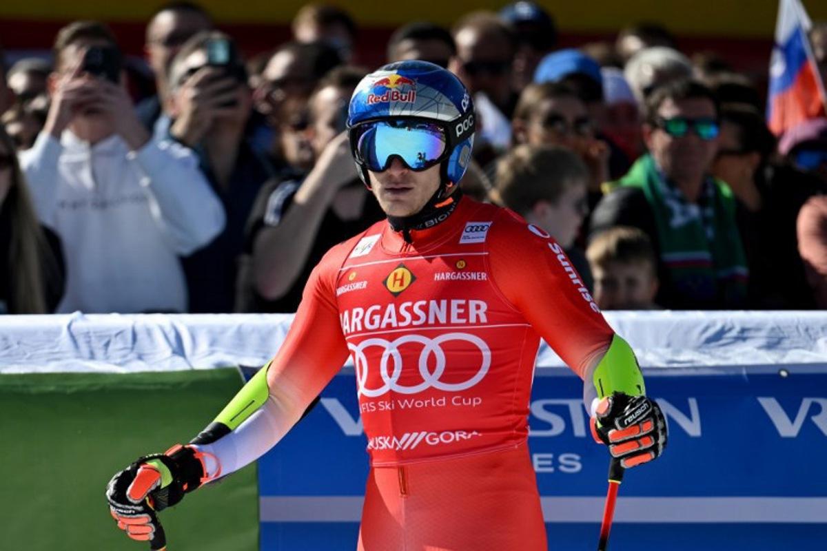 Switzerland's Marco Odermatt reacts after crossing the finish line during the second run of the Men's Giant Slalom event, part of FIS Alpine Ski World Cup 2025-2026 in Kranjska Gora, Slovenia, on March 7, 2026.  JURE MAKOVEC / AFP