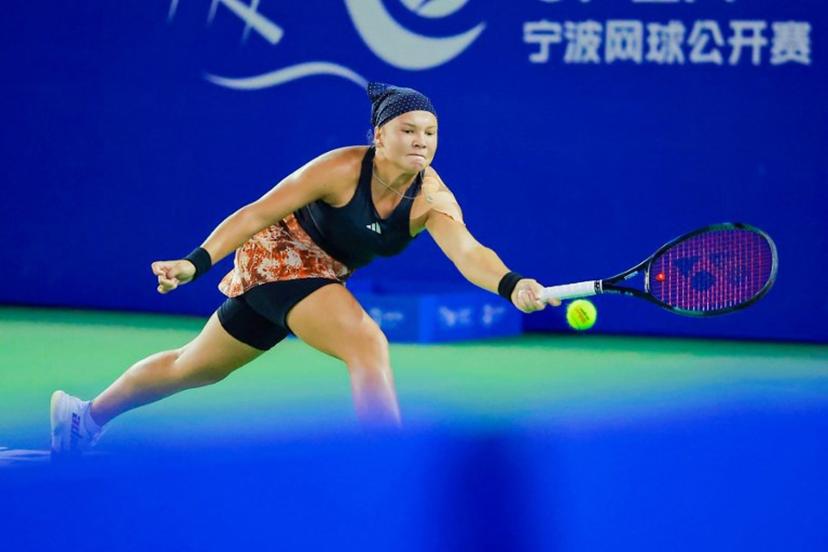 Diana Shnaider of Russia hits a return against Petra Kvitova of Czech Republic (not pictured) during the women's singles quarter-final match at WTA Ningbo Open tennis tournament in Ningbo, in China's eastern Zhejiang province on September 28, 2023.  AFP