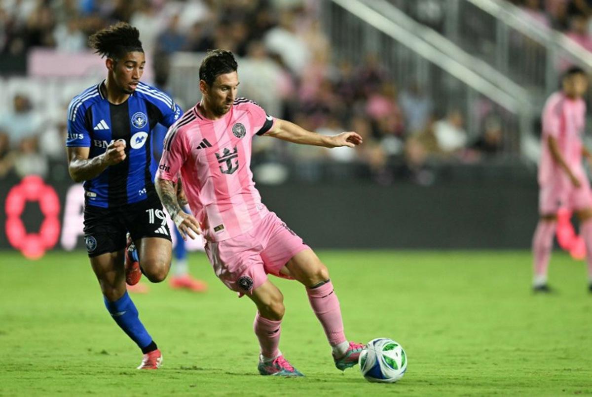 Inter Miami's Argentine forward #10 Lionel Messi and CF Montreal's Canadian midfielder #19 Nathan Saliba vie for the ball during the Major League Soccer match between Inter Miami CF and CF Montreal at Chase Stadium in Fort Lauderdale, Florida, on May 28, 2025.  CHANDAN KHANNA / AFP