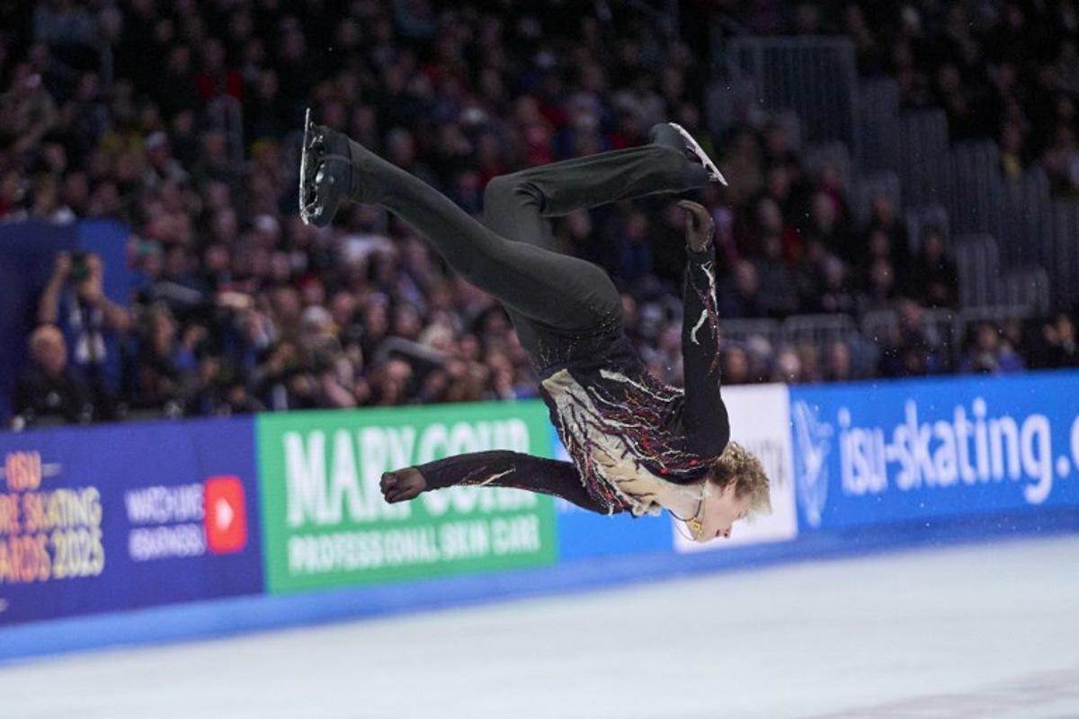USA's Ilia Malinin does a back flip during the Men's Free Skating program of the 2025 ISU World Figure Skating Championships at TD Garden in Boston, Massachusetts, on March 29, 2025.  Geoff Robins / AFP