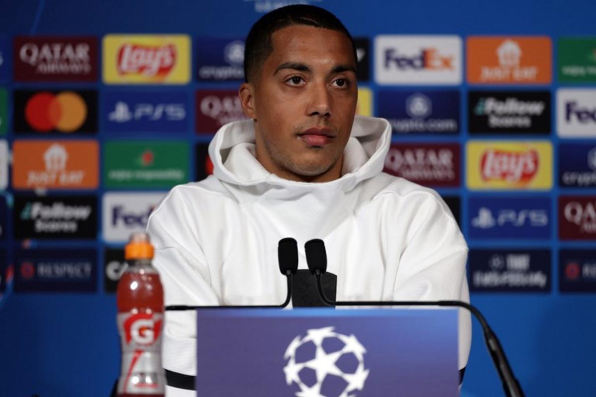 Aston Villa's Belgian midfielder #08 Youri Tielemans gives a press conference on the eve of the UEFA Champions League quarter final first leg football match against Paris Saint-Germain at the Parc des Princes stadium in Paris, on April 8, 2025.  FRANCK FIFE / AFP