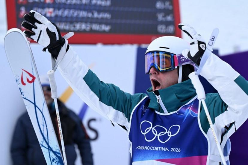 Australia's Cooper Woods celebrates winninng the freestyle skiing men's moguls final 2 during the Milano Cortina 2026 Winter Olympic Games at Livigno Aerials & Moguls Park, in Livigno (Valtellina), on February 12, 2026.  Kirill KUDRYAVTSEV / AFP