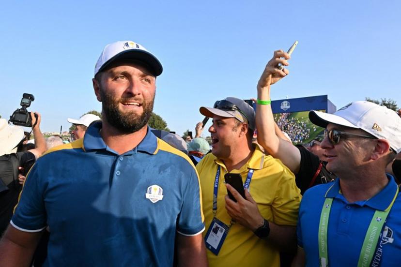 Europe's Spanish golfer, Jon Rahm walks through the crowds as European players celebrate their victory on the final day of play in the 44th Ryder Cup at the Marco Simone Golf and Country Club in Rome on October 1, 2023.   Alberto PIZZOLI / AFP