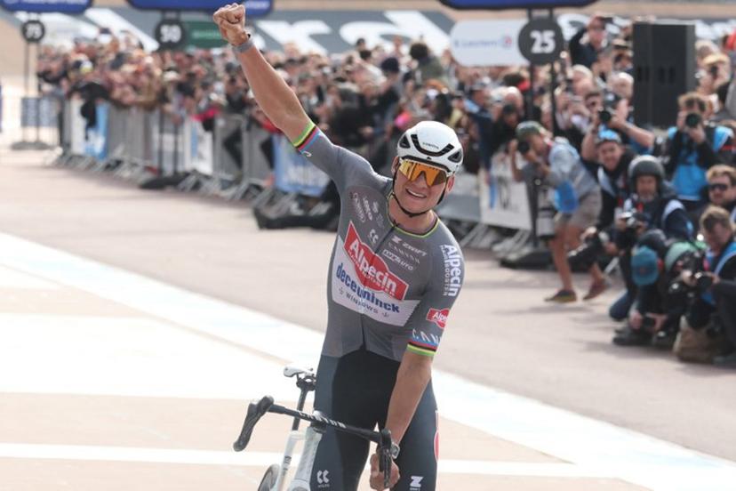 Alpecin-Deceuninck's Dutch rider Mathieu van der Poel celebrates after crossing the finish line to win the 122nd edition of the Paris-Roubaix one-day classic cycling race, 259,2 km between Compiegne and Roubaix, at the Vélodrome André-Pétrieux in Roubaix, northern France on April 13, 2025.  Francois LO PRESTI / AFP